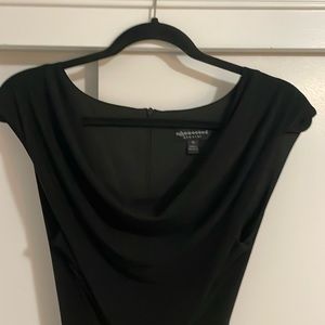 Black jumpsuit. Sleeveless, cowl neck. Size 10. Versatile - dress up or down.